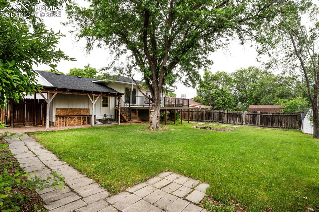 61 Louis Nelson Road Pueblo, CO 81001 - Photo 48 of 50 a front view of a house with a yard