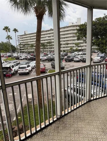 a kitchen with a refrigerator and a stove