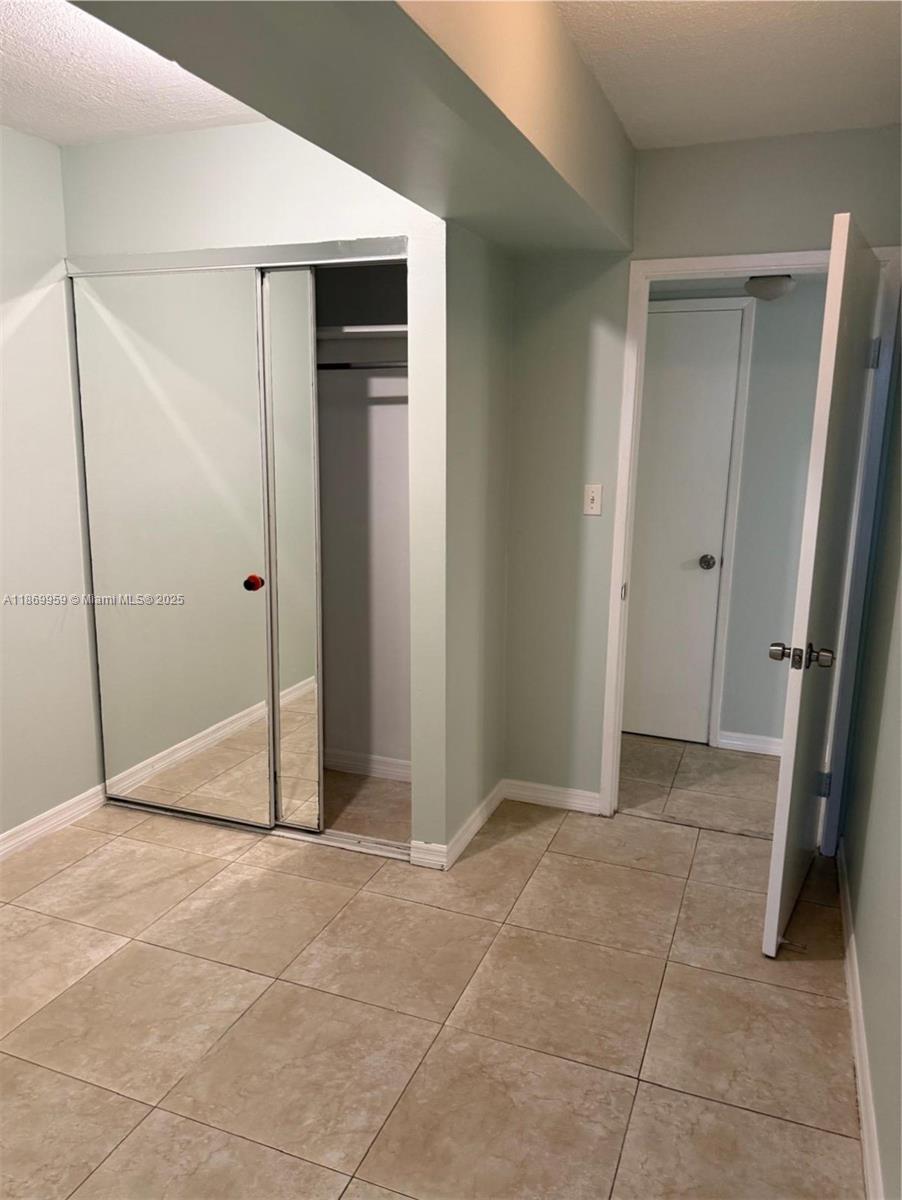 1710 Northeast 191st Street, Unit 2083 Miami, FL 33179 - Photo 3 of 36 a view of an empty room