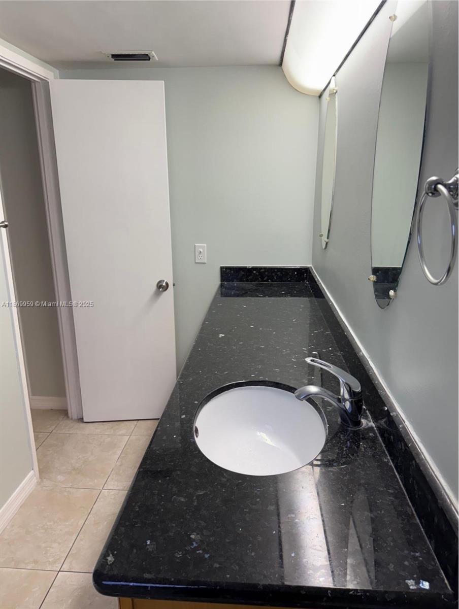 1710 Northeast 191st Street, Unit 2083 Miami, FL 33179 - Photo 34 of 36 a close view of tap