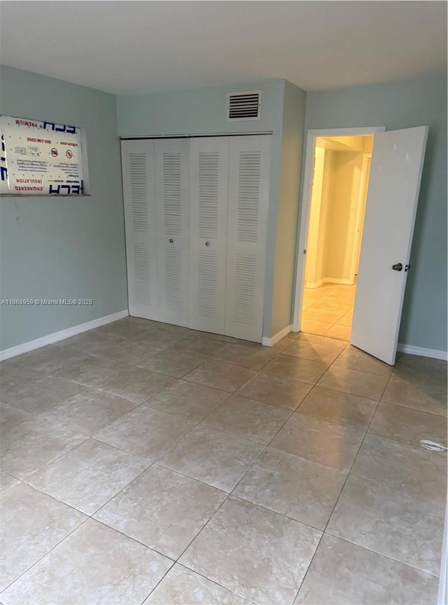 1710 Northeast 191st Street, Unit 2083 Miami, FL 33179 - Photo 8 of 36 a view of an empty room