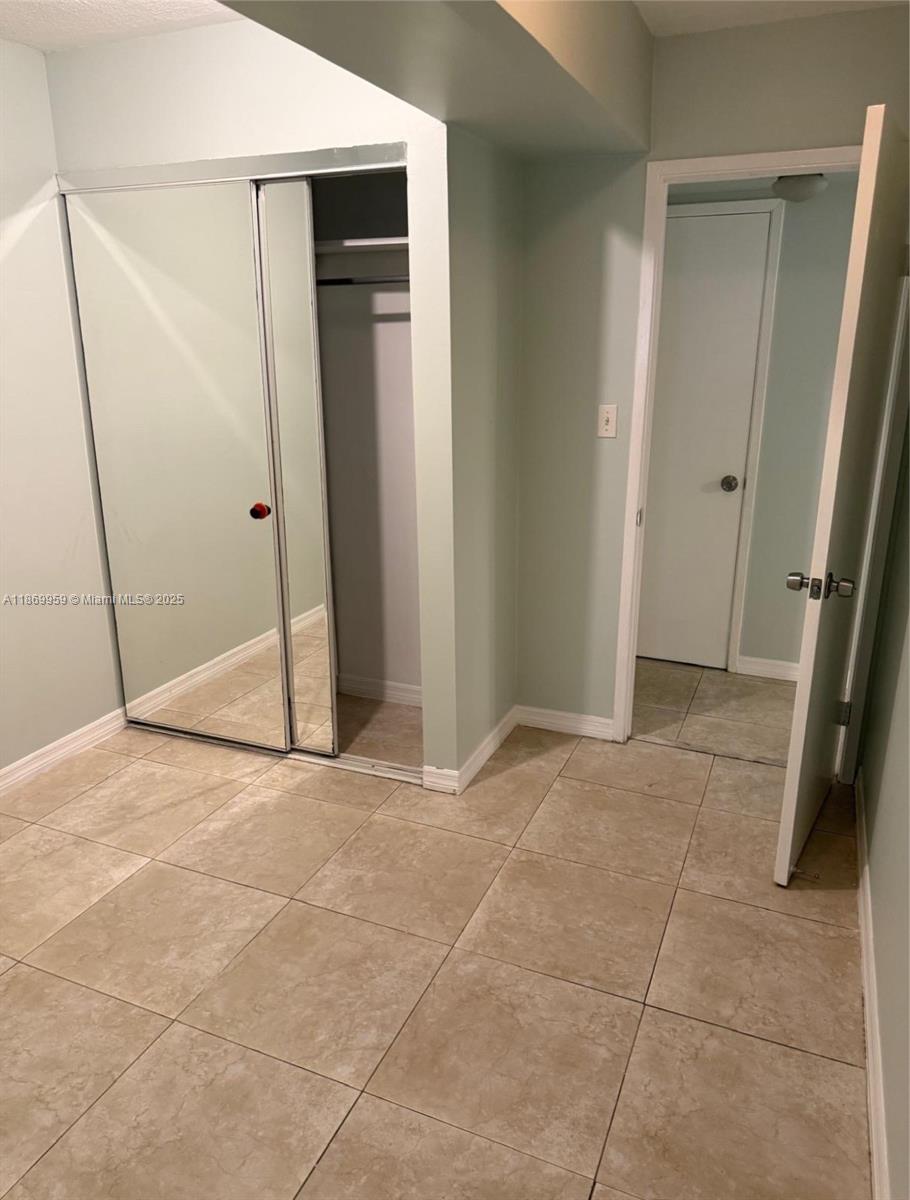 1710 Northeast 191st Street, Unit 2083 Miami, FL 33179 - Photo 9 of 36 a view of an empty room