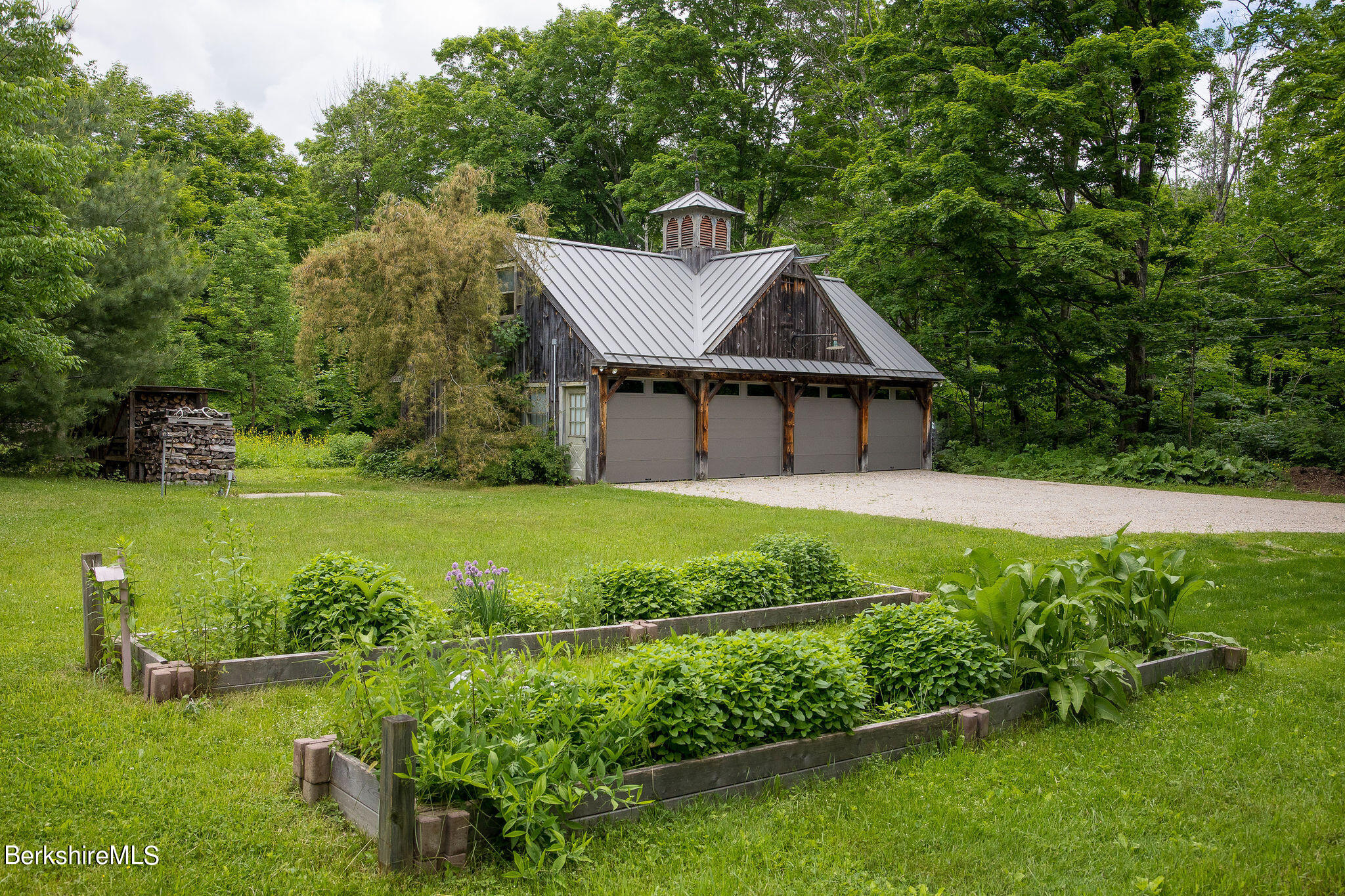 960 South Undermountain Road Sheffield, MA 01257 - Photo 3 of 31 a house view with a garden space