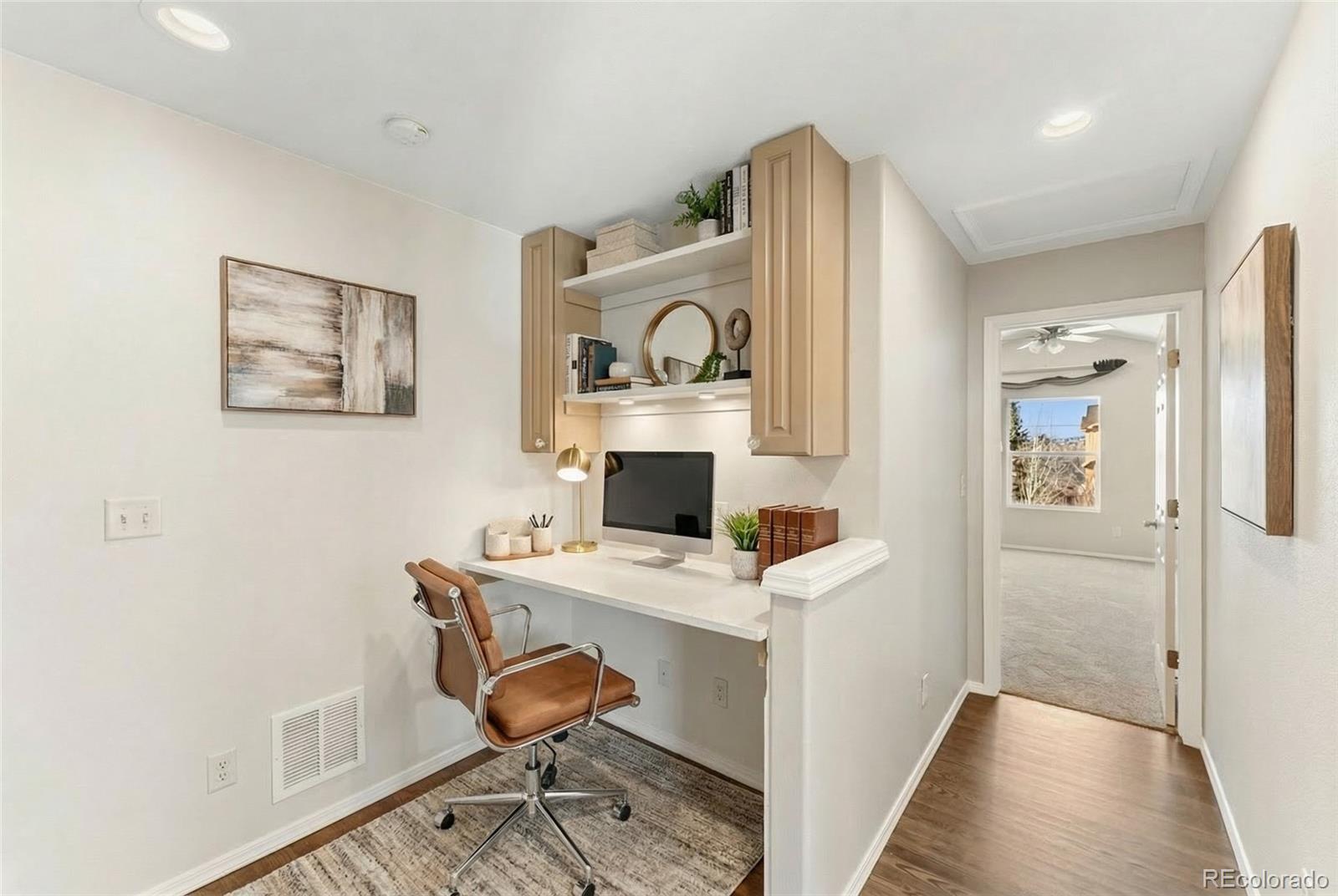 10744 Rhinestone Drive Colorado Springs, CO 80908 - Photo 14 of 24 a view of workspace with wooden floor