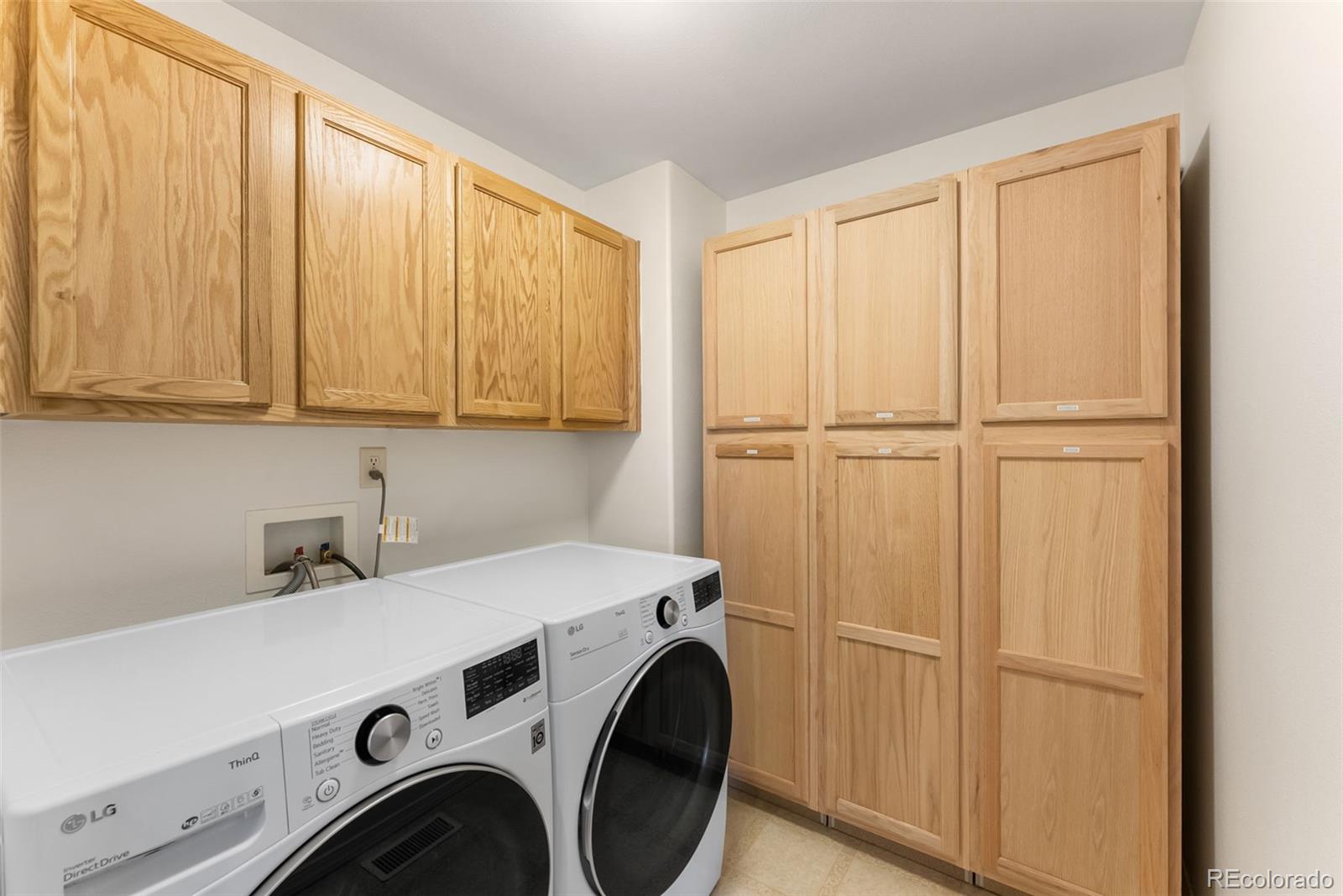 10744 Rhinestone Drive Colorado Springs, CO 80908 - Photo 18 of 24 a utility room with dryer and washer