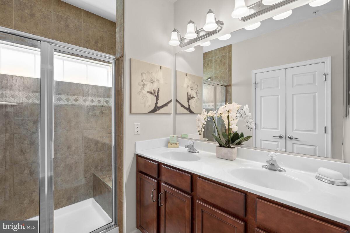 2145 Little Sorrel Way Silver Spring, MD 20902 - Photo 17 of 39 Double vanity and a large shower with a bench