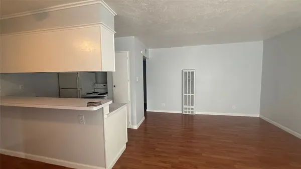a view of a kitchen with a sink and dishwasher