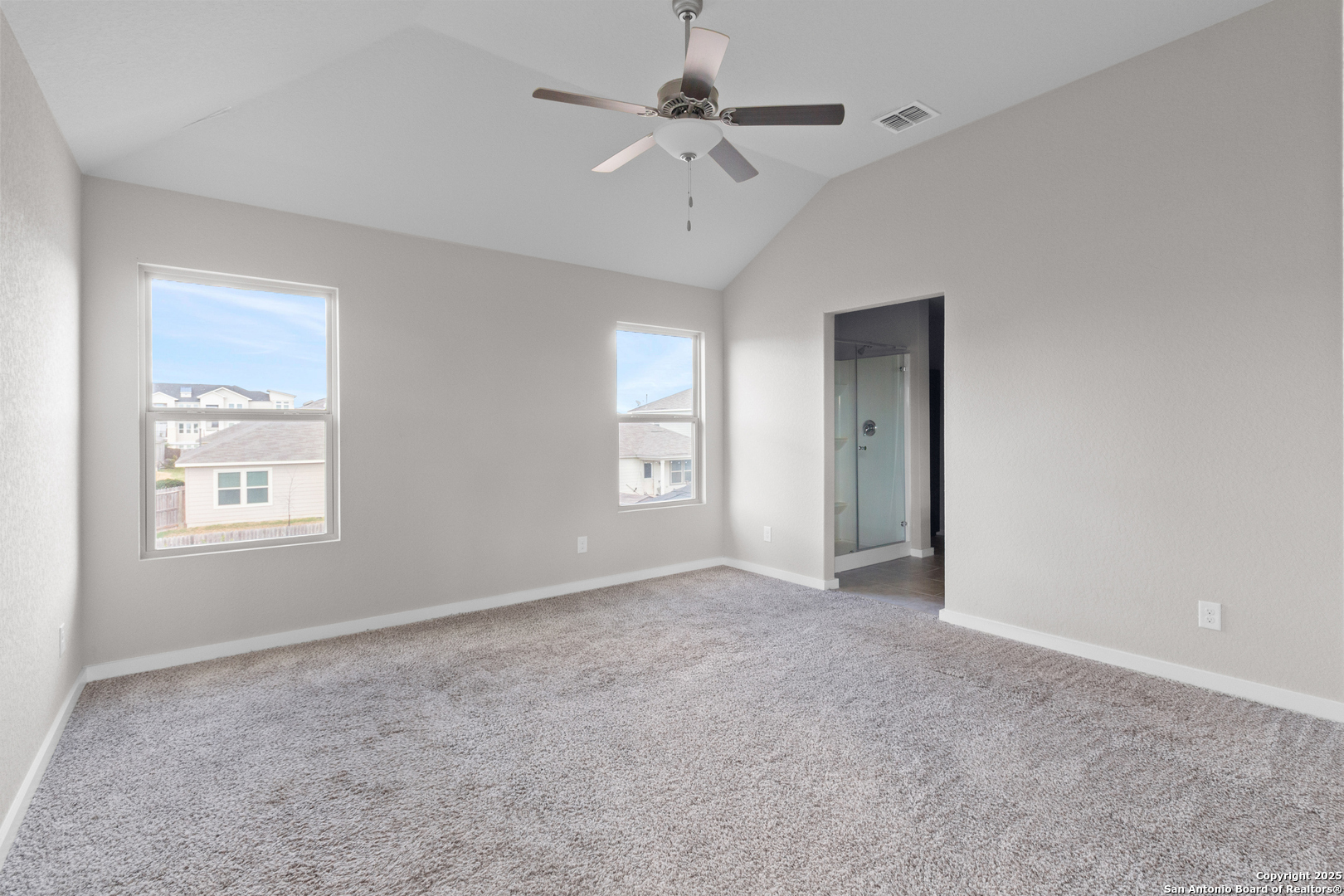 10527 Penelope Way Converse, TX 78109 - Photo 6 of 12 a view of an empty room with a window