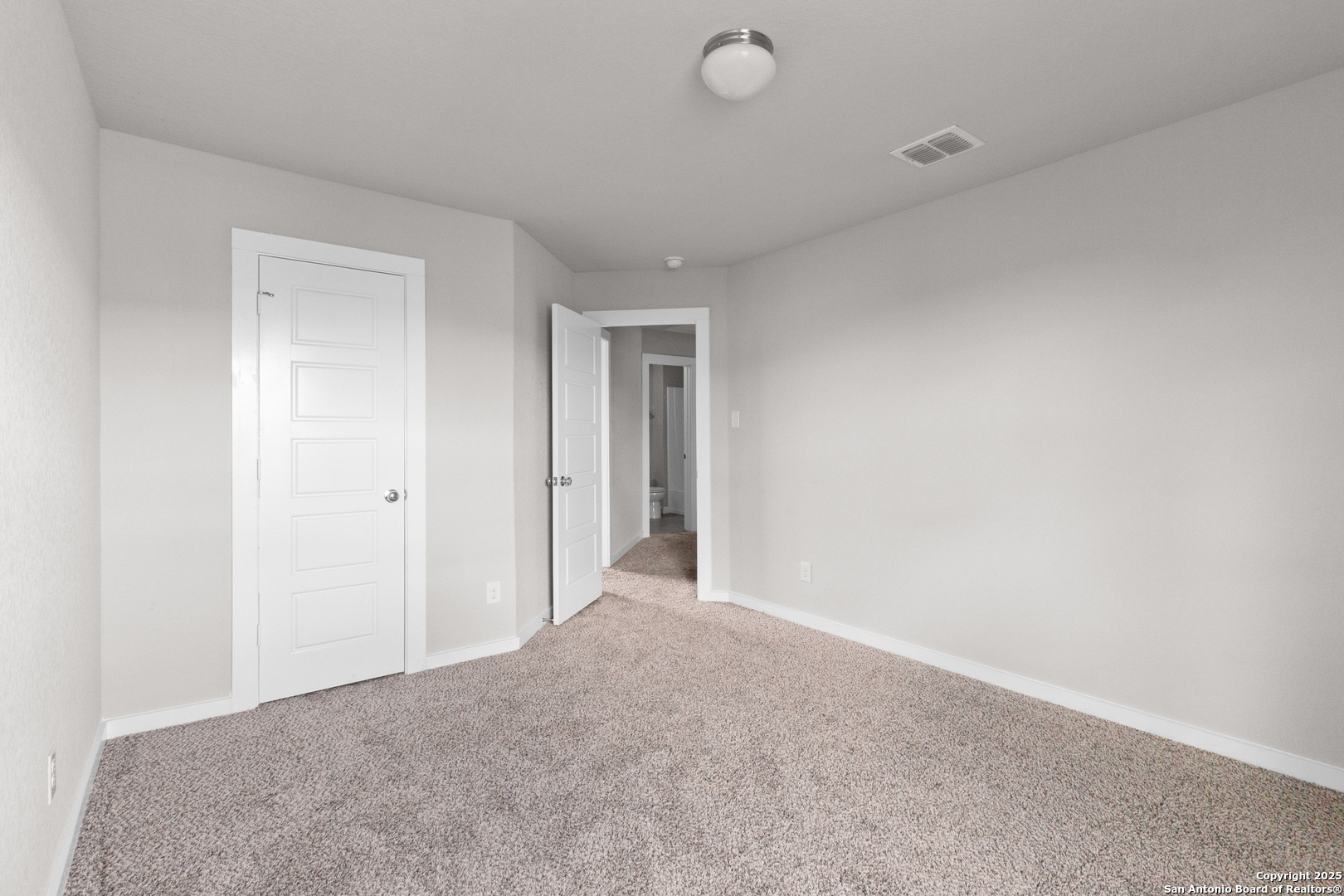 10527 Penelope Way Converse, TX 78109 - Photo 9 of 12 a view of an empty room and closet area