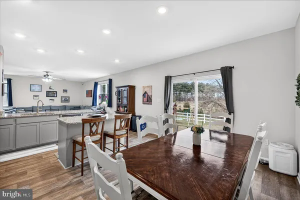 a view of a storage and utility room with washer and dryer