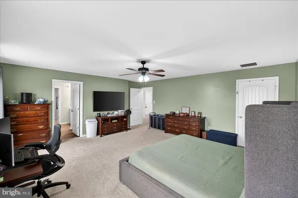 a bathroom with a double vanity sink mirror and