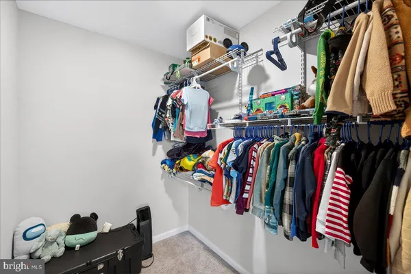 a bed room with a bed and a window