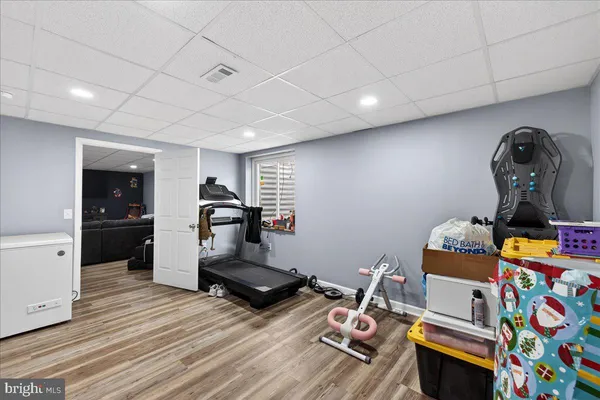 a view of a workspace with furniture and toys