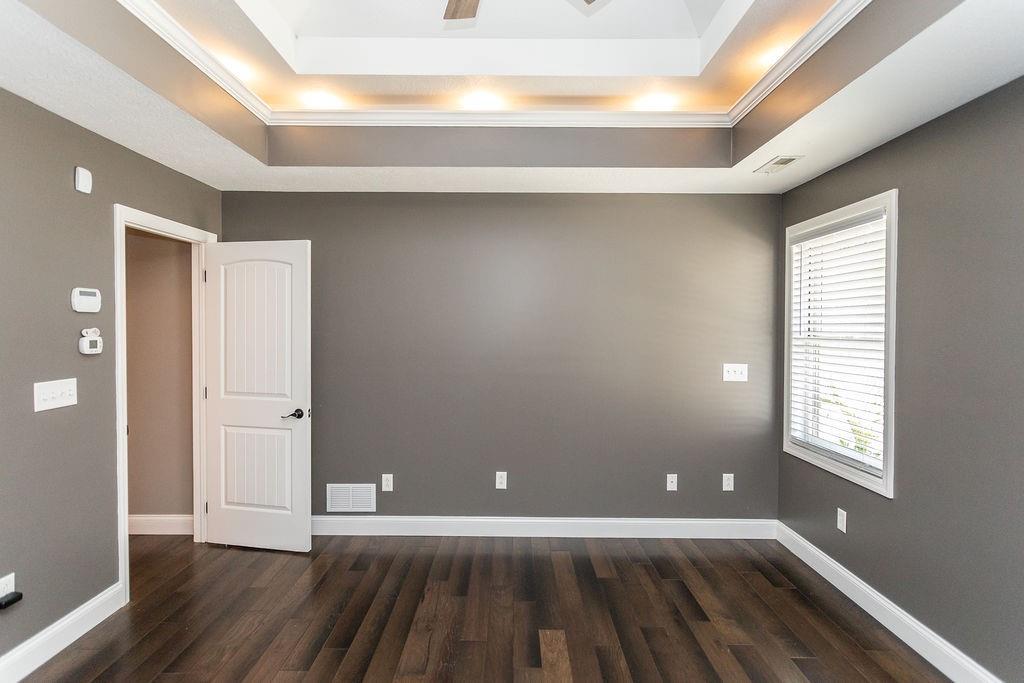 159 Reservoir Hill Road Uniontown, PA 15401 - Photo 23 of 50 a view of an empty room with wooden floor and a window