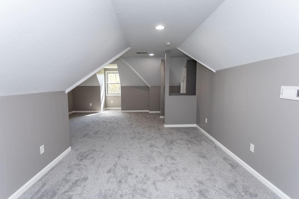 159 Reservoir Hill Road Uniontown, PA 15401 - Photo 28 of 50 an empty room with windows and fireplace