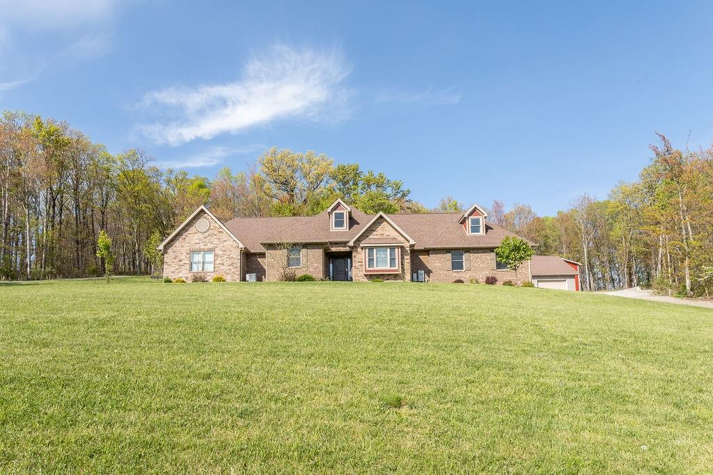 159 Reservoir Hill Road Uniontown, PA 15401 - Photo 3 of 50 a big house with a big yard and large trees