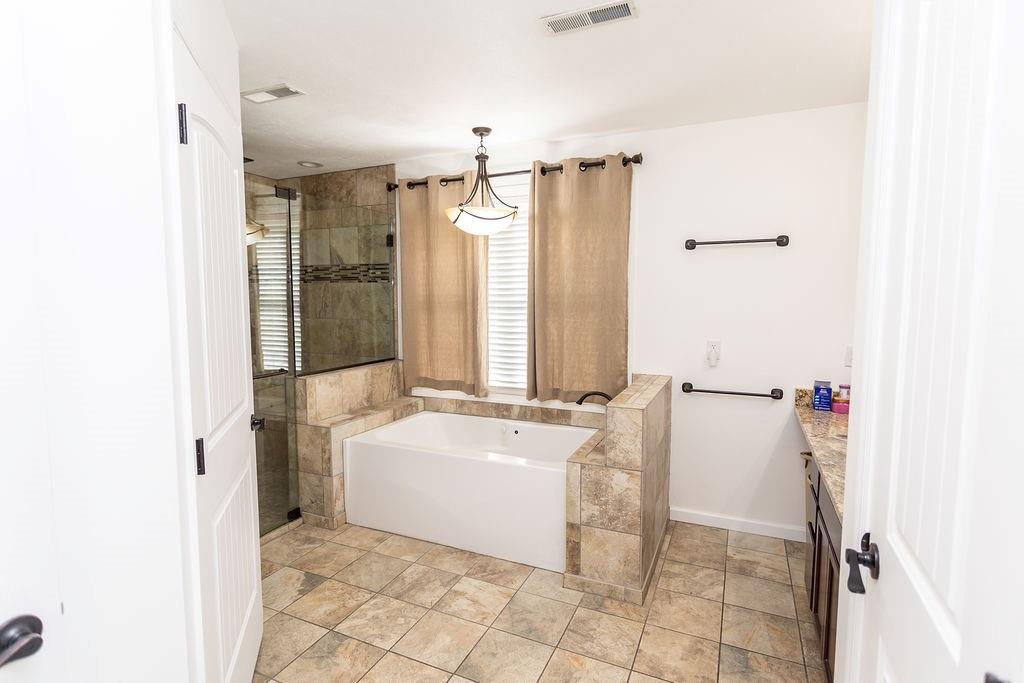 159 Reservoir Hill Road Uniontown, PA 15401 - Photo 32 of 50 a bathroom with a sink a mirror and a shower