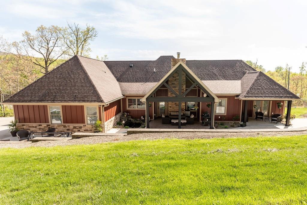 159 Reservoir Hill Road Uniontown, PA 15401 - Photo 7 of 50 a front view of a house with yard and patio