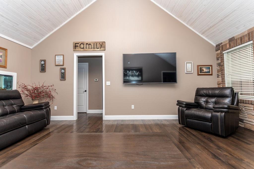 159 Reservoir Hill Road Uniontown, PA 15401 - Photo 10 of 50 a living room with furniture and a flat screen tv