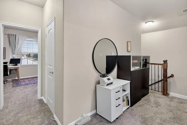 a view of living room with washer and dryer