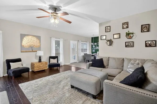 a living room with furniture and a couch