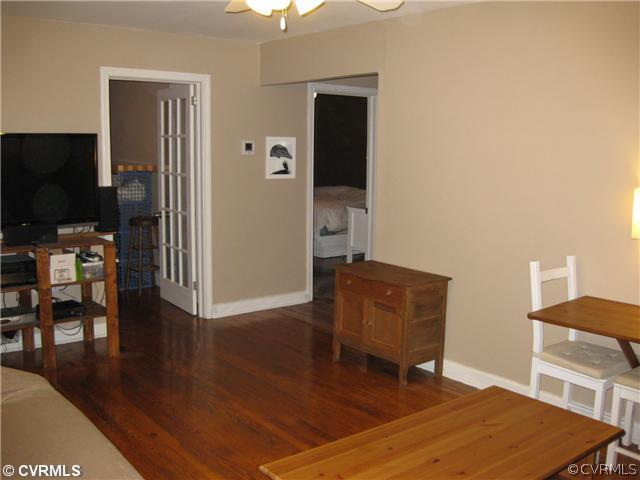 5407 Colleen Road Sandston, VA 23150 - Photo 7 of 11 a living room with furniture and a flat screen tv