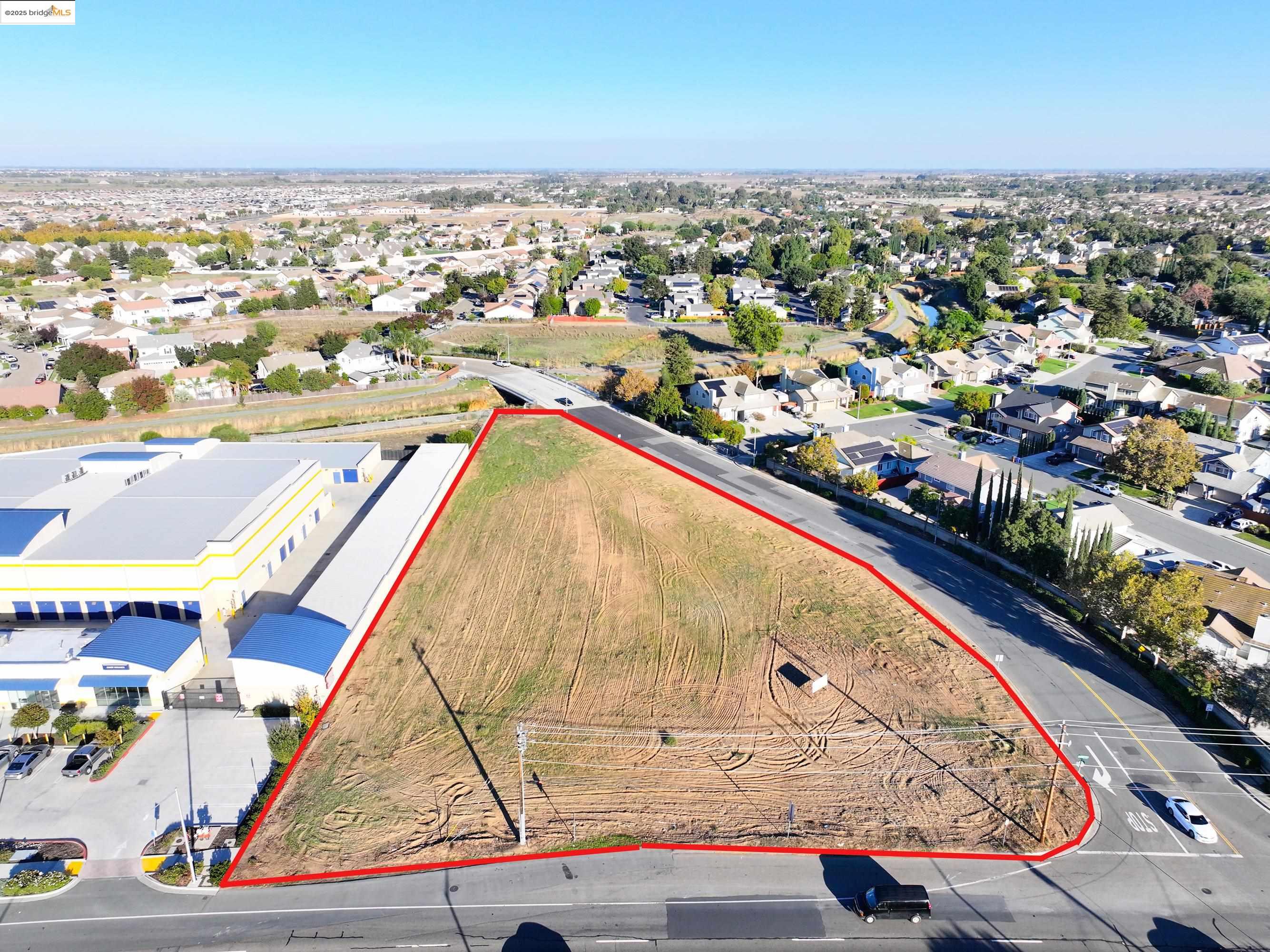 0 Main Street Oakley, CA 94561 - Photo 4 of 9 Aerial perspective of suburban area featuring property boundaries highlighted