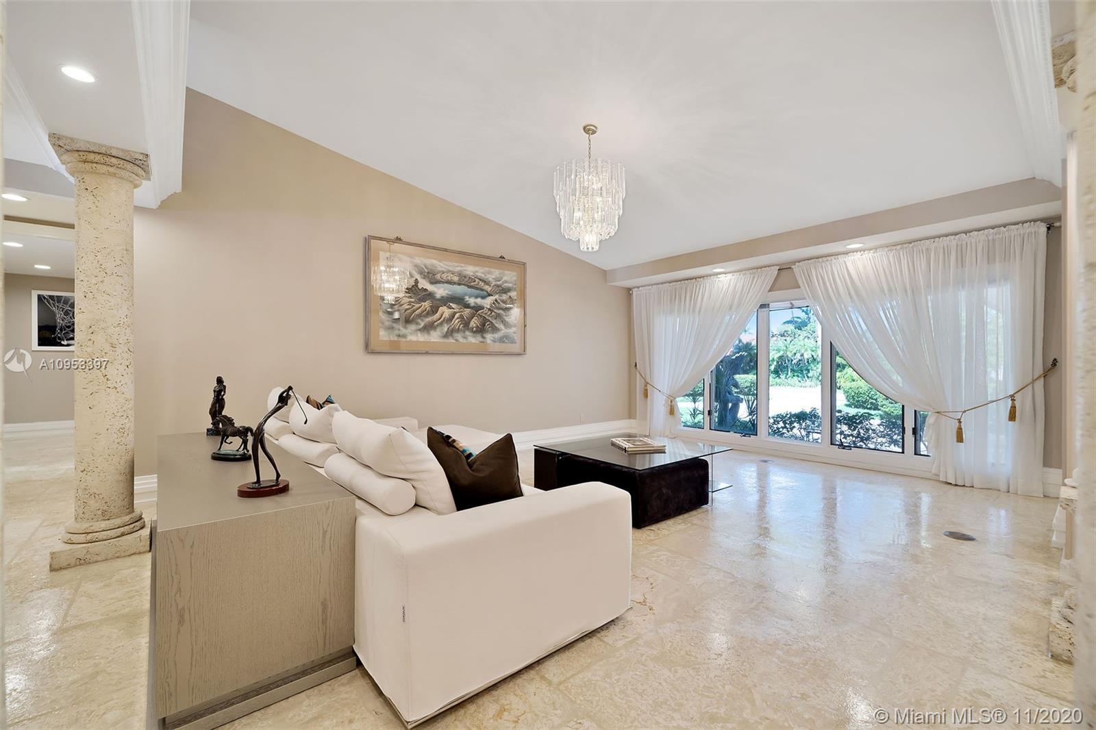 9100 Southwest 103rd Street Miami, FL 33176 - Photo 11 of 47 a living room with furniture and a large window