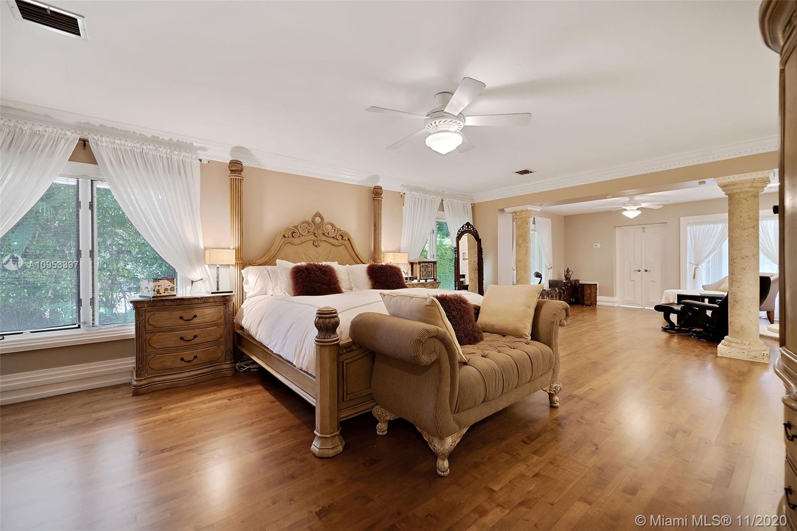 9100 Southwest 103rd Street Miami, FL 33176 - Photo 14 of 47 a bed room with a bed and a large window