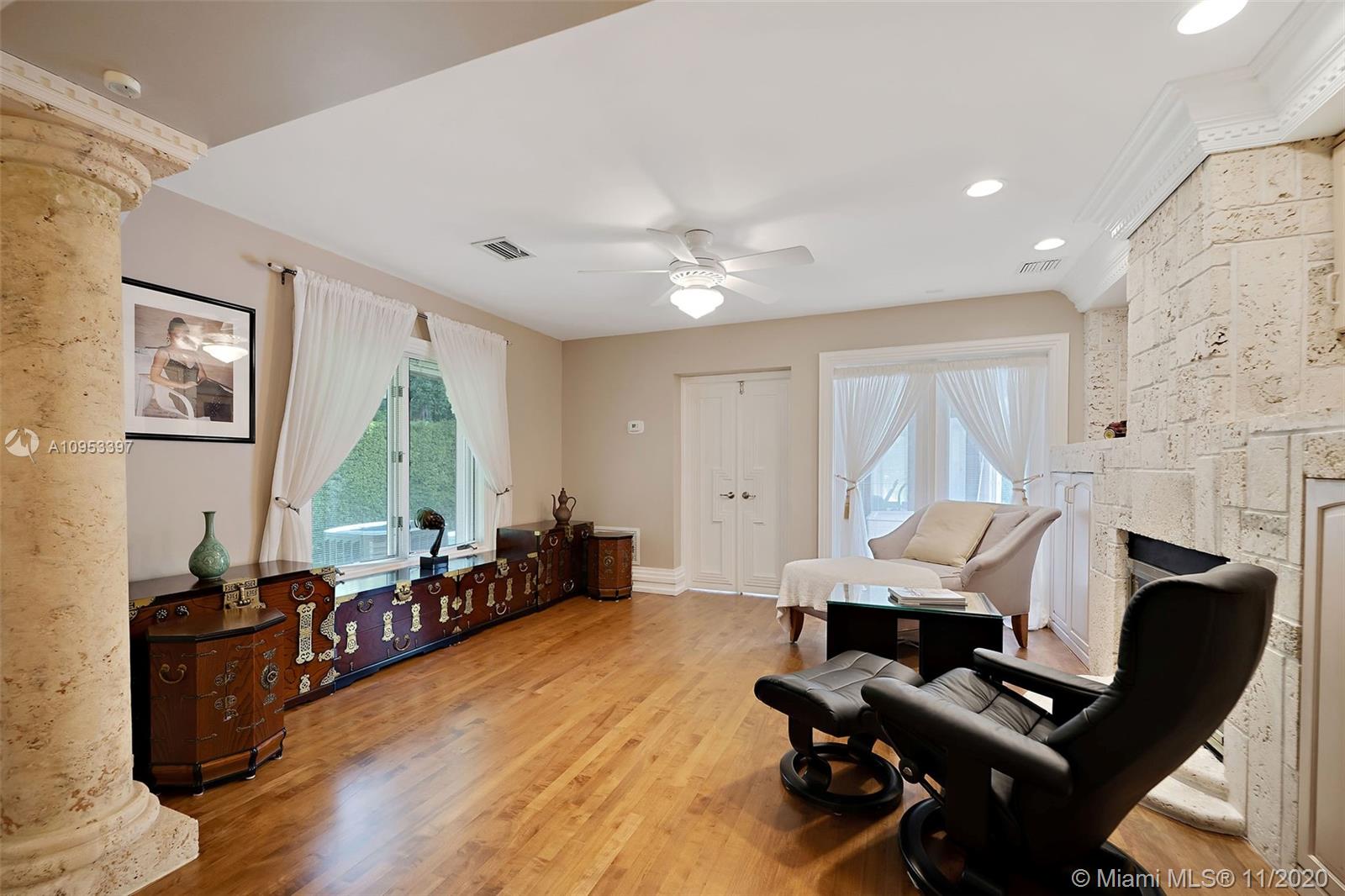 9100 Southwest 103rd Street Miami, FL 33176 - Photo 16 of 47 a workspace with furniture hardwood and a window