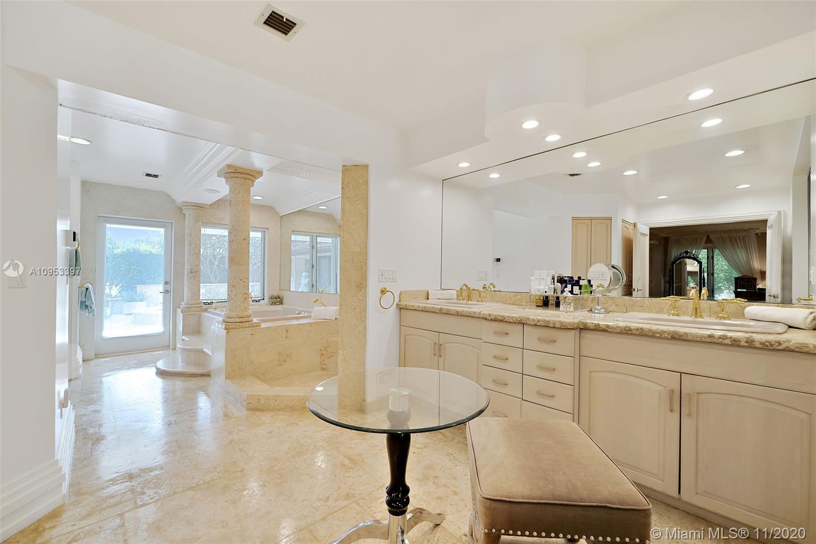 9100 Southwest 103rd Street Miami, FL 33176 - Photo 17 of 47 a kitchen with sink and mirror