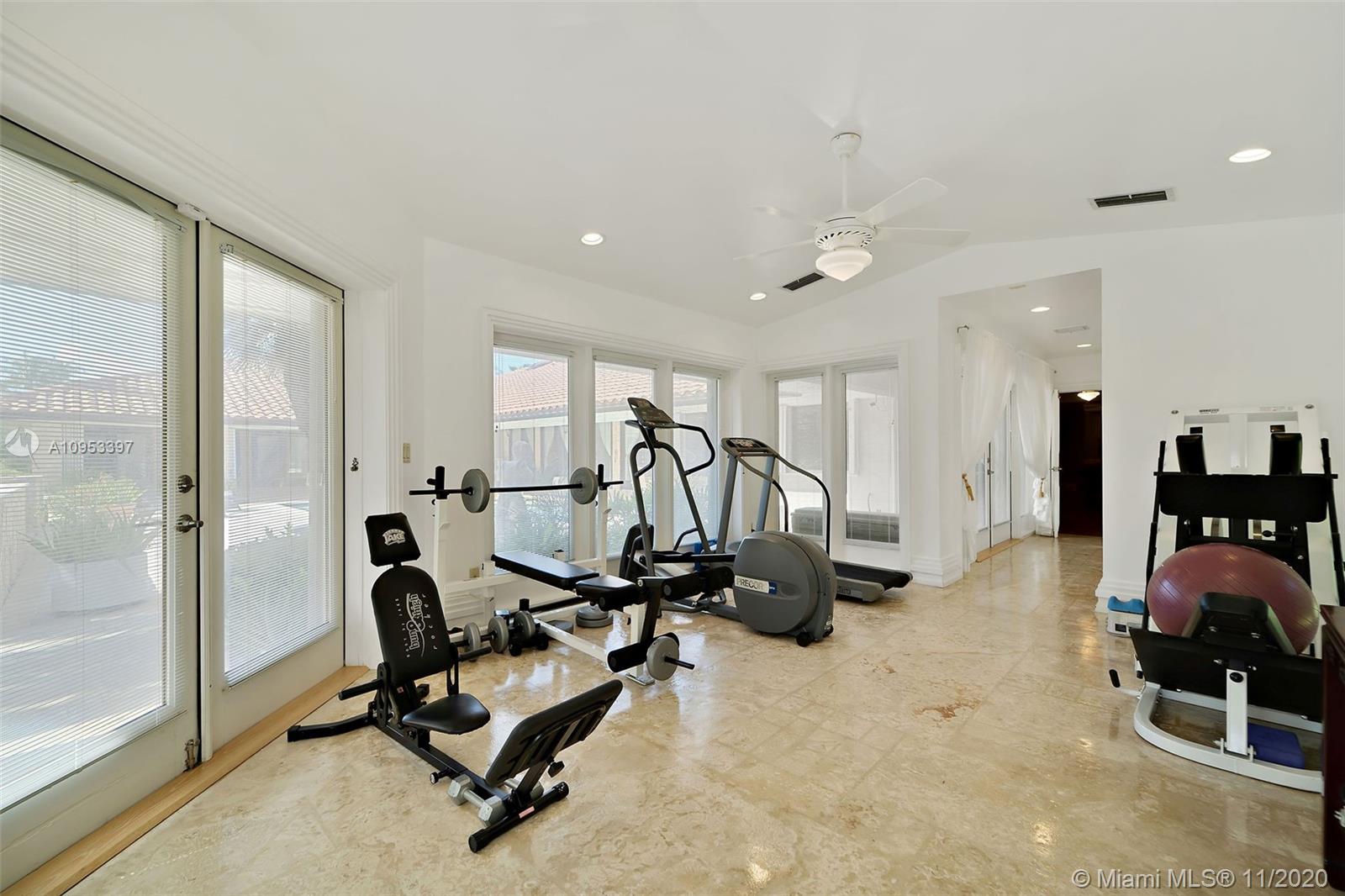 9100 Southwest 103rd Street Miami, FL 33176 - Photo 19 of 47 a view of a room with gym equipment