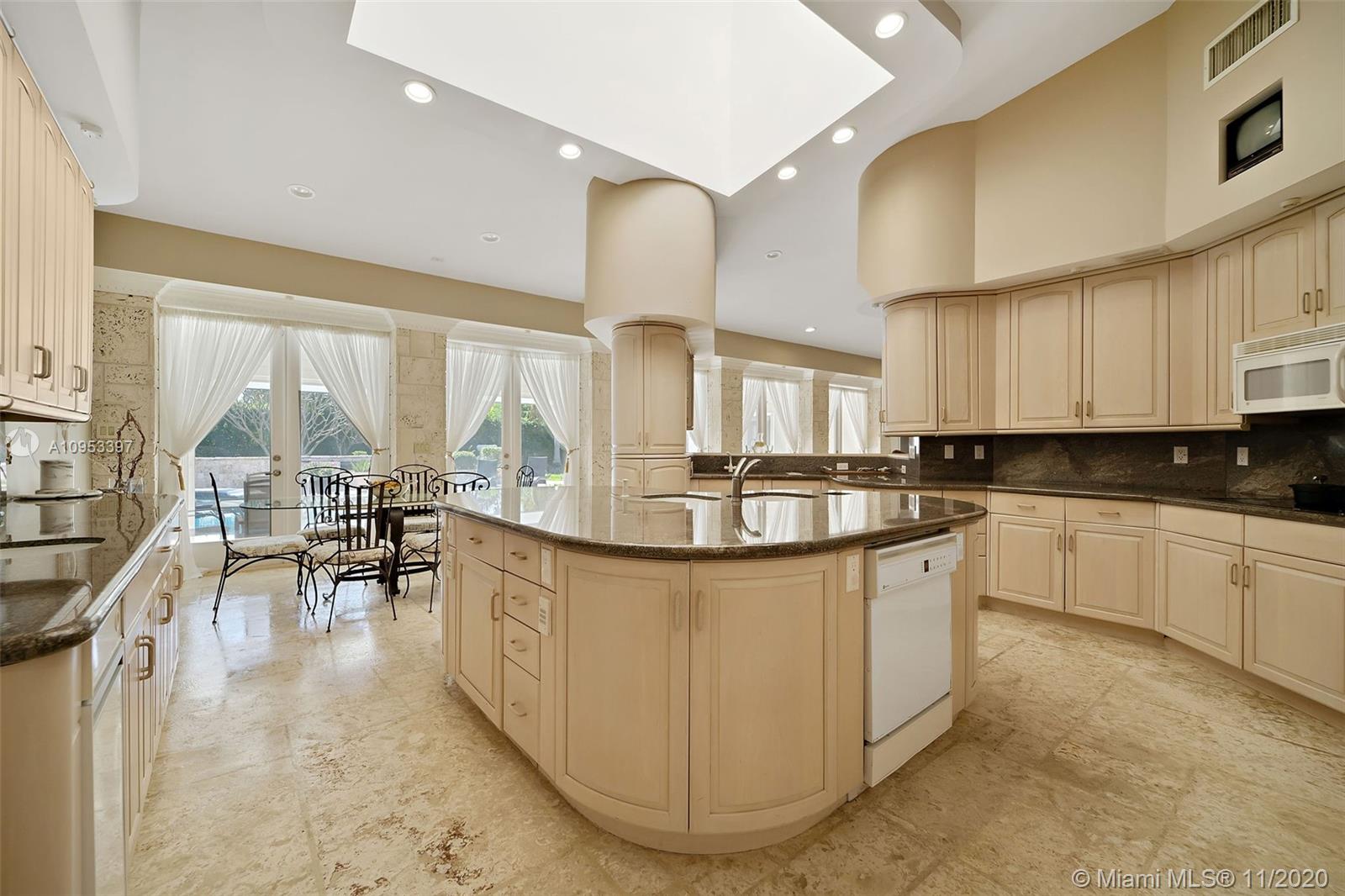 9100 Southwest 103rd Street Miami, FL 33176 - Photo 20 of 47 a kitchen with counter top space and appliances