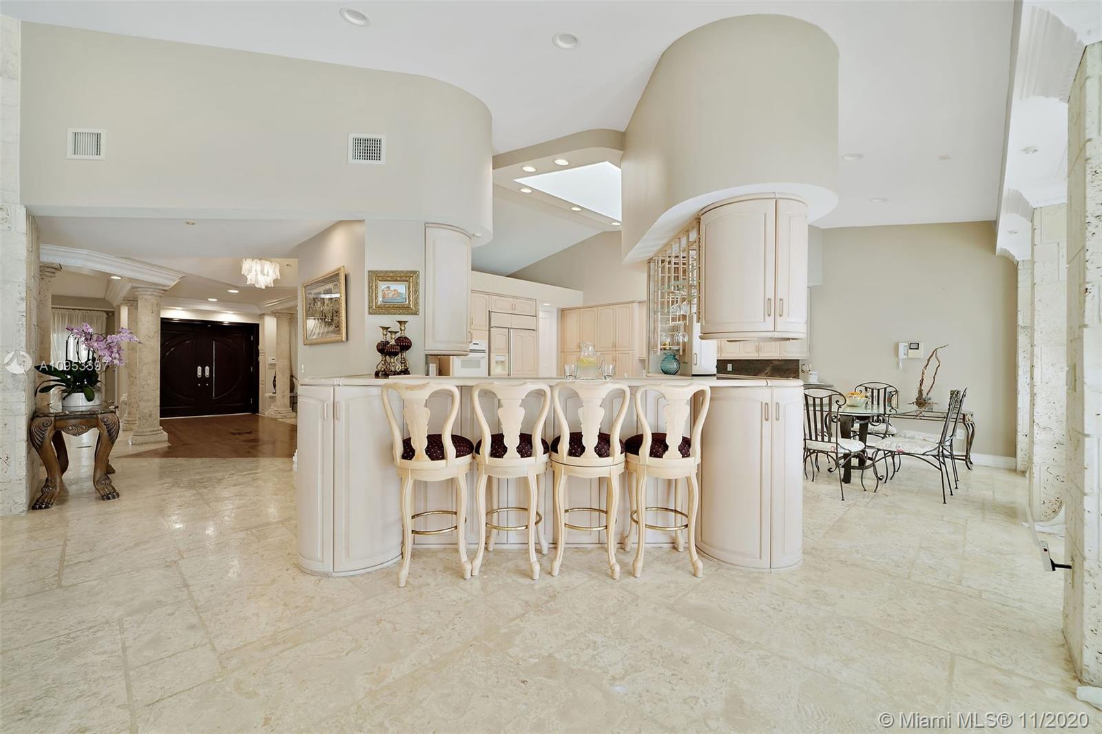9100 Southwest 103rd Street Miami, FL 33176 - Photo 23 of 47 a view of a livingroom with furniture and a kitchen