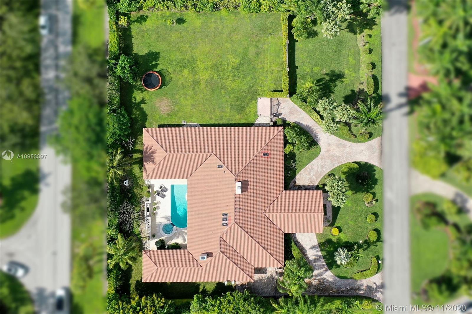 9100 Southwest 103rd Street Miami, FL 33176 - Photo 4 of 47 an aerial view of a house with yard swimming pool and outdoor seating