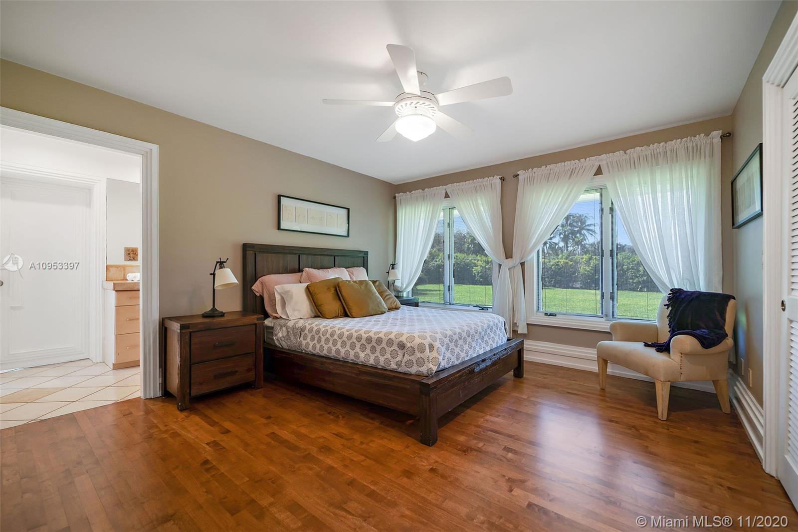 9100 Southwest 103rd Street Miami, FL 33176 - Photo 34 of 47 a living room with furniture and a large window