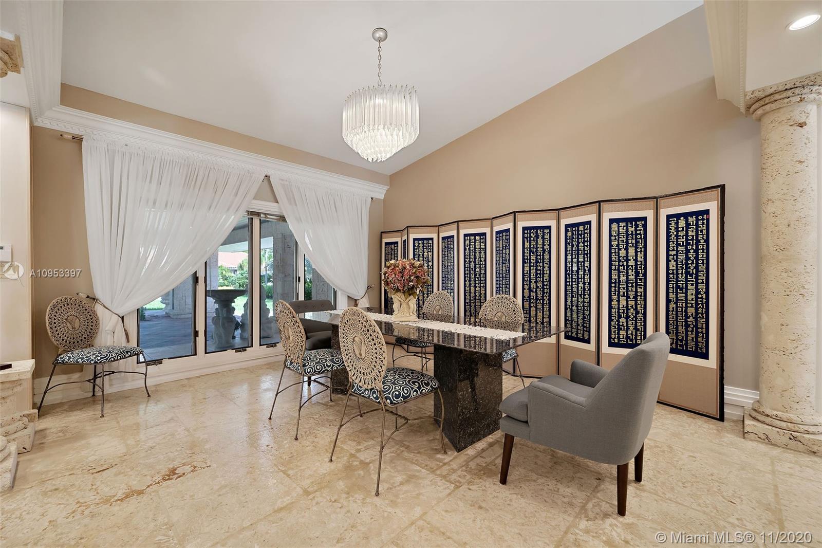 9100 Southwest 103rd Street Miami, FL 33176 - Photo 10 of 47 a living room with furniture and a large window