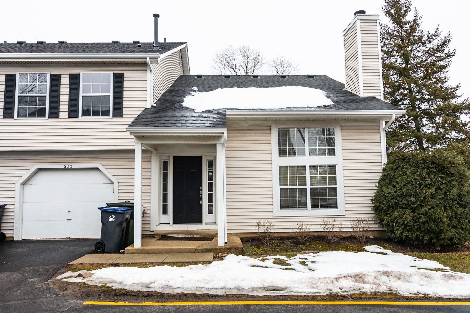 232 Butternut Lane, Unit 232 Streamwood, IL 60107 - Photo 1 of 16 a front view of a house