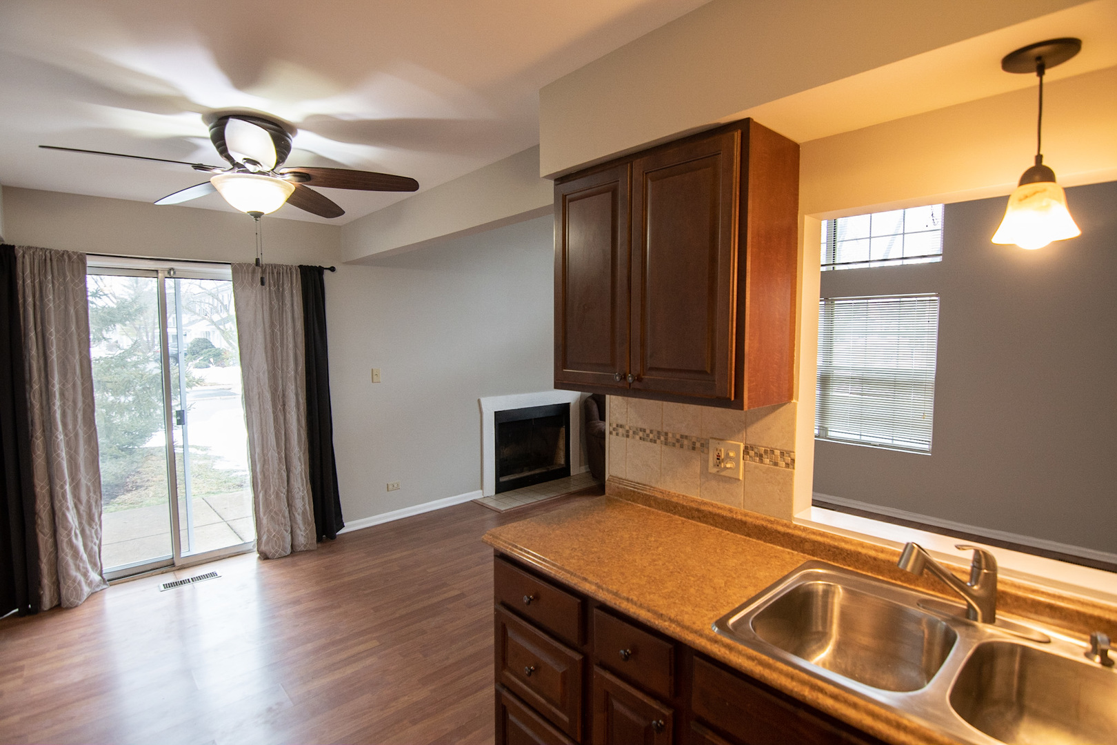 232 Butternut Lane, Unit 232 Streamwood, IL 60107 - Photo 5 of 16 a kitchen that has a sink and a stove