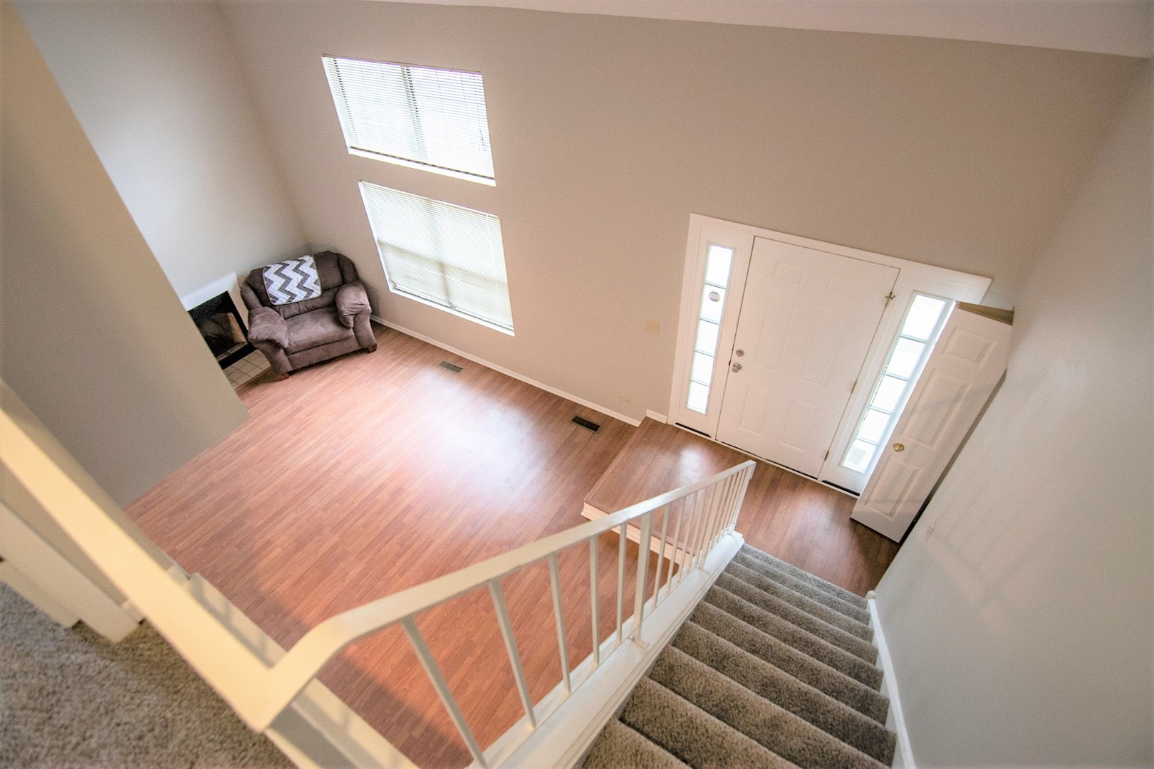 232 Butternut Lane, Unit 232 Streamwood, IL 60107 - Photo 10 of 16 a view of an entryway with wooden floor