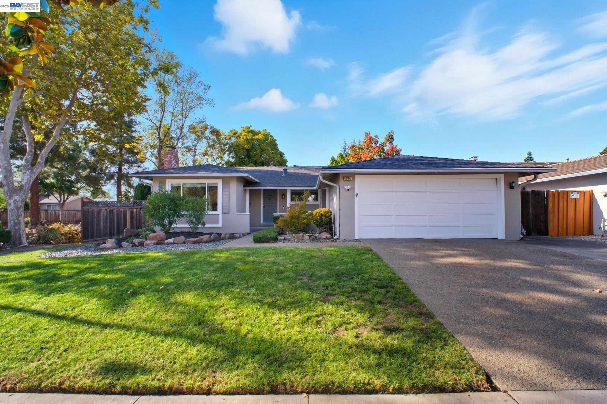 4987 Winchester Place Newark, CA 94560 - Photo 1 of 25 a front view of house with yard and outdoor seating
