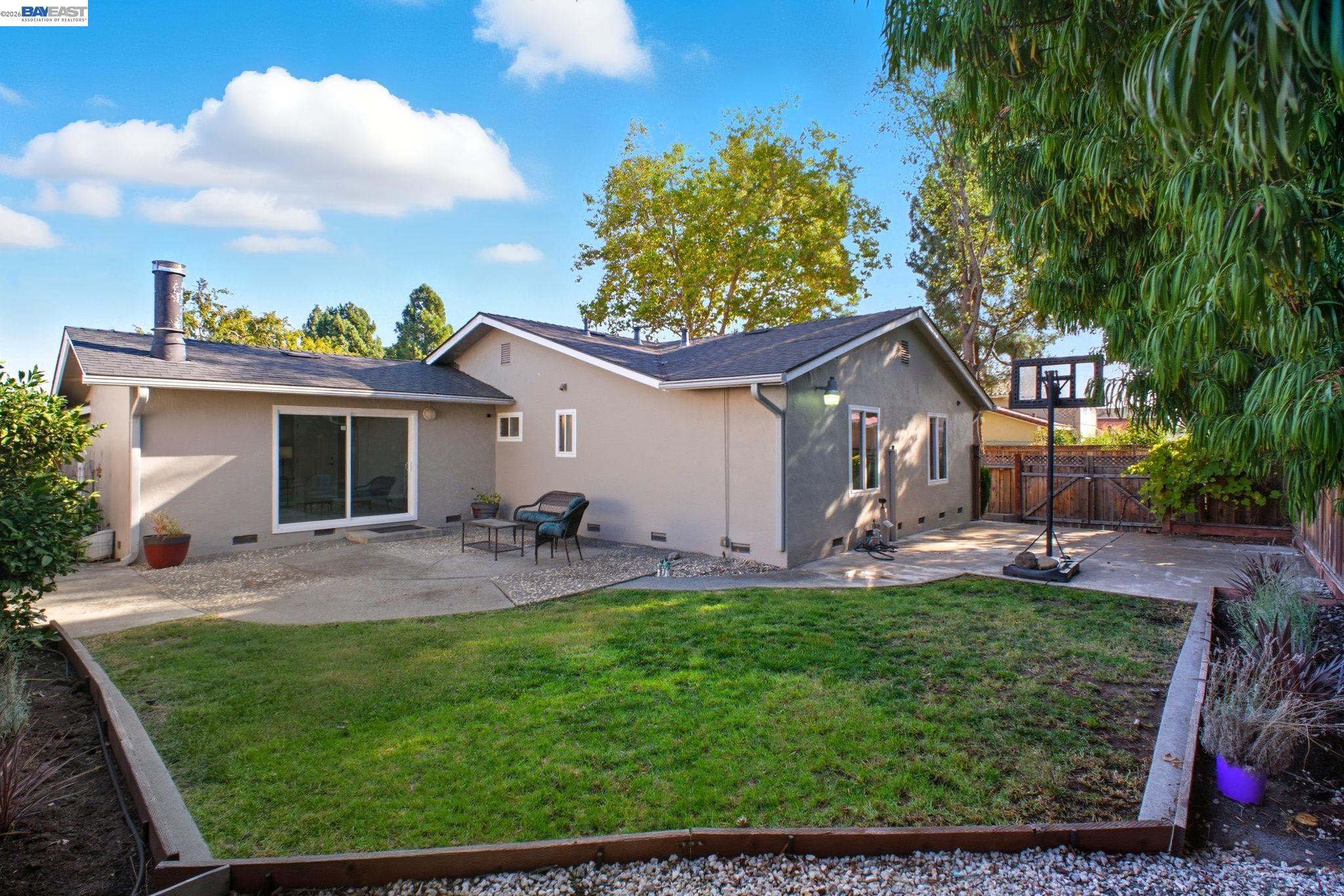 4987 Winchester Place Newark, CA 94560 - Photo 20 of 25 a front view of house with yard and outdoor seating