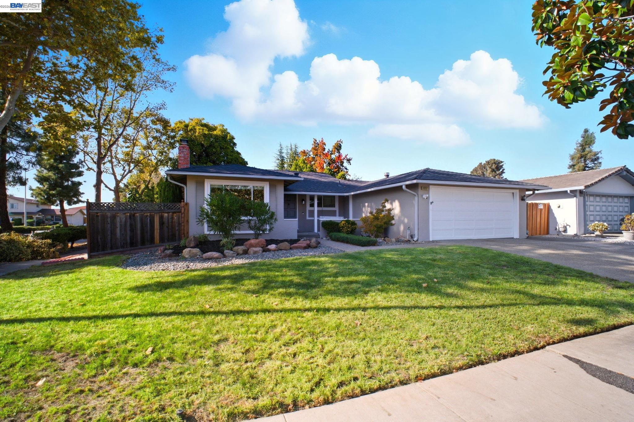 4987 Winchester Place Newark, CA 94560 - Photo 2 of 25 a view of house with outdoor space and seating area