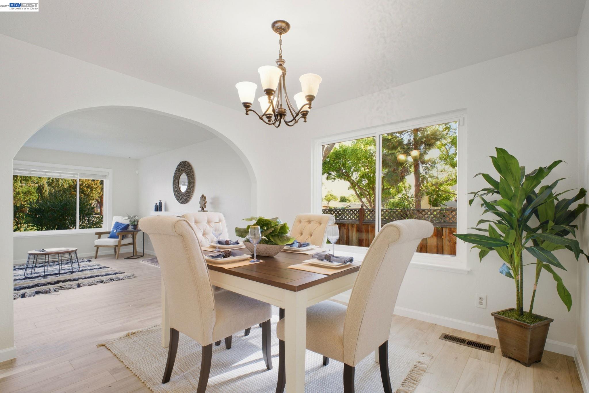 4987 Winchester Place Newark, CA 94560 - Photo 7 of 25 a view of a dining room with furniture window and outside view
