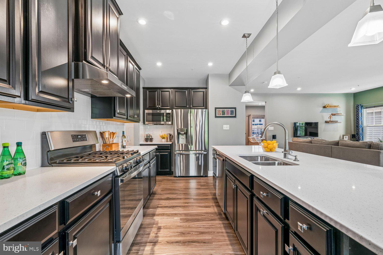 1275 Upper Patuxent Ridge Road Odenton, MD 21113 - Photo 32 of 107 GAS COOKING & ISLAND W/ BUILT-IN SINK