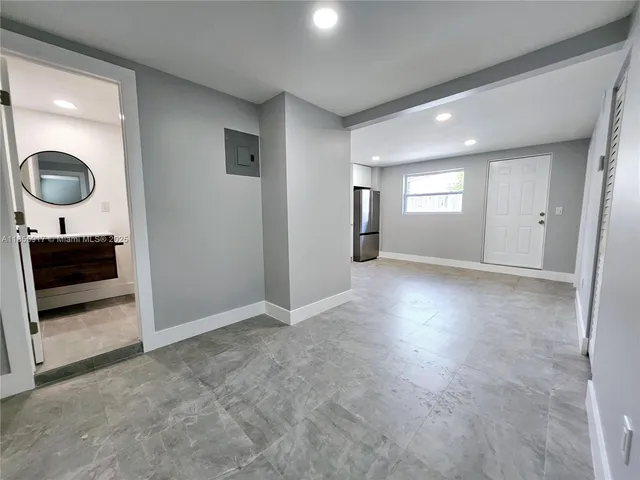 a view of a livingroom and a dishwasher