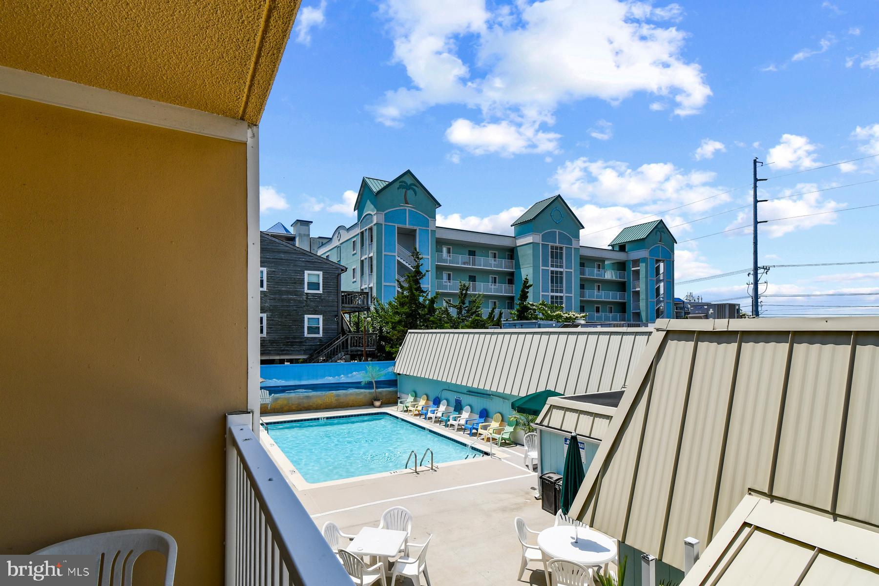 11 62nd Street, Unit 205 Ocean City, MD 21842 - Photo 11 of 18 a view of balcony with furniture