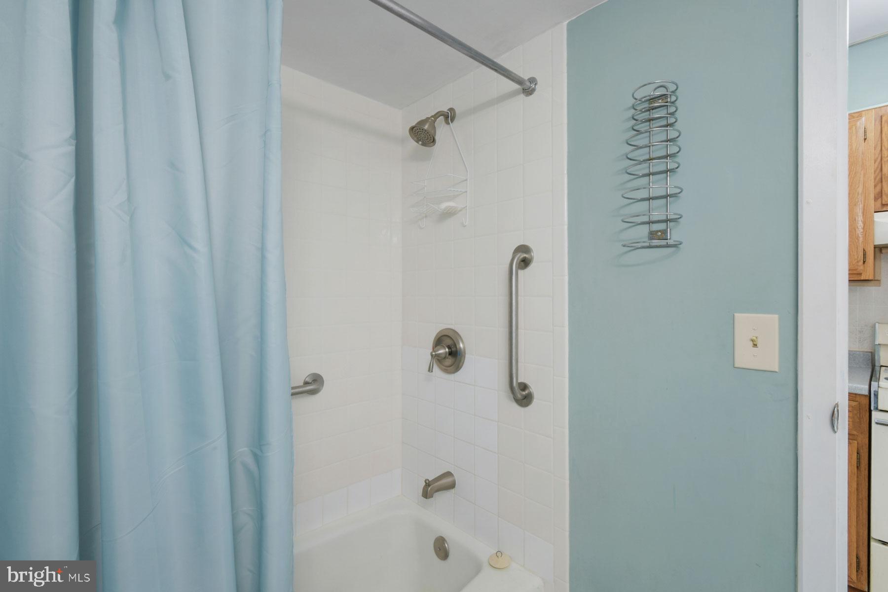 11 62nd Street, Unit 205 Ocean City, MD 21842 - Photo 14 of 18 a bathroom with a shower