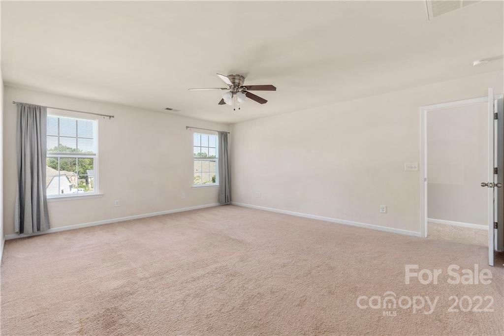 2831 Turquoise Circle Davidson, NC 28036 - Photo 21 of 44 a view of an empty room with a window