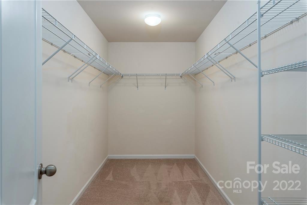 2831 Turquoise Circle Davidson, NC 28036 - Photo 23 of 44 a view of a room with racks on the wall